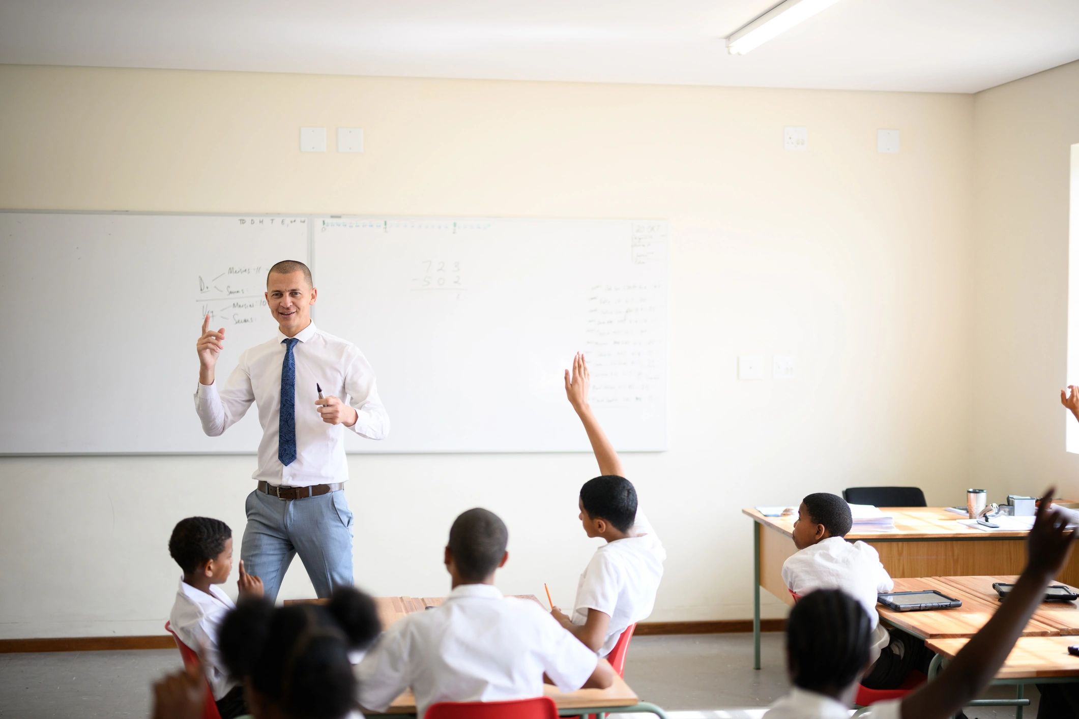 Classroom scene with students participating in learning